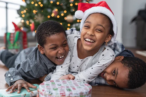 Kids smiling in santa hats